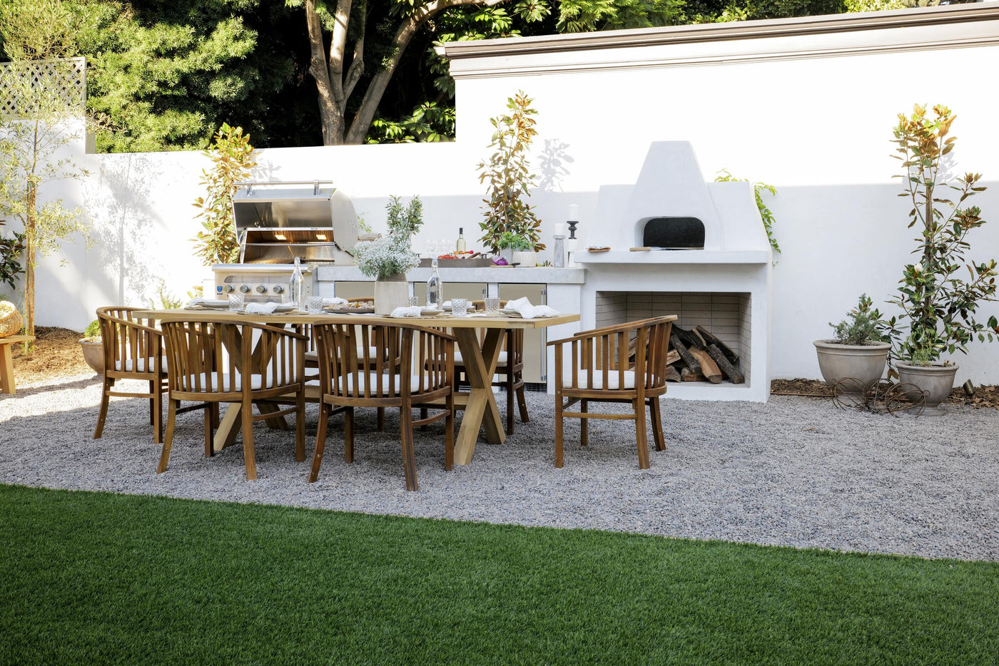 Premium outdoor kitchen with built-in grill and fire features — Living Outdoorsy